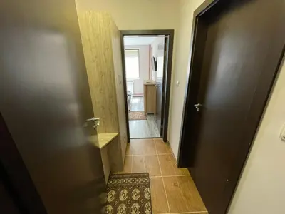 a hallway with a door leading to a bathroom at Комплекс Свети Георги in Pamporovo