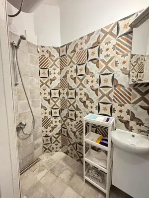 a bathroom with a shower and a toilet and a sink at My place in Sofia - Top center - 2 bedrooms - Self check-in in Sofia