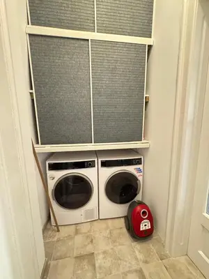 a laundry room with a washing machine and a window at My place in Sofia - Top center - 2 bedrooms - Self check-in in Sofia