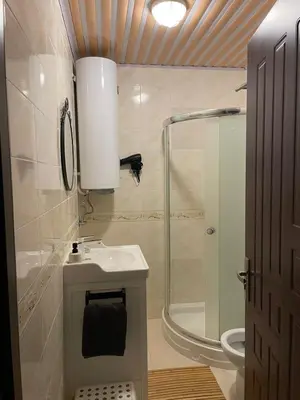 a bathroom with a sink and a shower and a toilet at Castle Studio 203 Pamporovo in Pamporovo