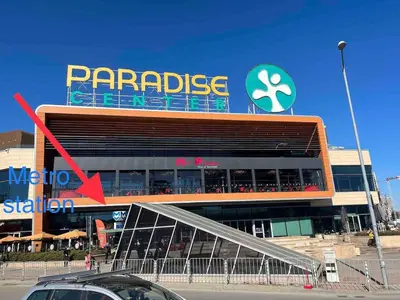a parking garage with a sign on top of it at Turquoise City Exotic Bliss in Sofia