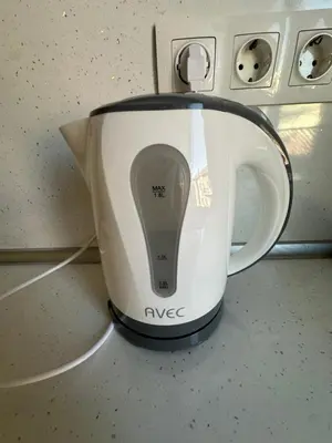 a white tea kettle sitting on top of a counter at Lions Bridge C-E-N-T-R-A-L in Sofia
