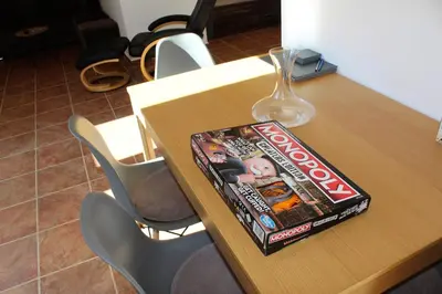 a table with a dvd box on top of it at One bedroom ap 602 IN RILA PARK for 6 people in Borovets