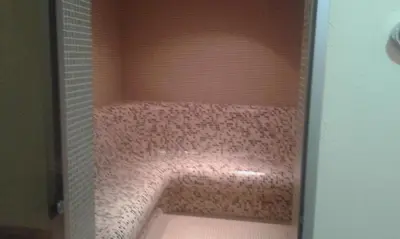 a bathroom with a pink shower with a pink tub at Family Hotel Relax in Strelcha
