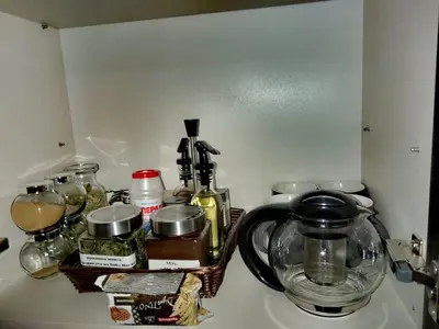 a counter with a tea kettle and other items on it at Апартамент за гости в Пампорово in Pamporovo