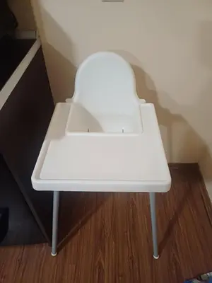a white table sitting on top of a wooden floor at Apartment Melania in Complex Royal Towers in Bansko