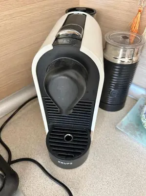 a black and white blender sitting on top of a counter at Cozy apartmen with Mountain view in Bansko