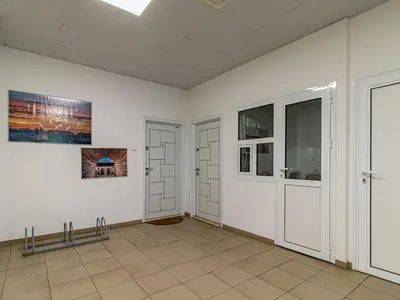 a room with white walls and two doors at Stay Inspired - Sofia Retreat in Sofia