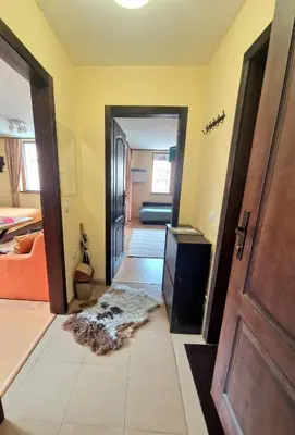 a hallway with a door leading into a room at Mountain View Home Maggie in Bansko