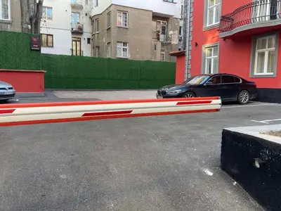 a red and white curb in a parking lot at M star rooms, Private Parking, Sofia TOP CENTER in Sofia