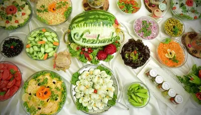 a table with many plates of food on it at Pamporovo hotel Snezhanka A640 in Pamporovo