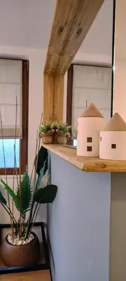 a kitchen with a counter with houses on it at Leaf apartment in Blagoevgrad