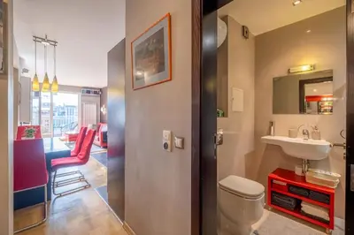 a bathroom with a toilet and a sink at iLonka's Home 1 BDR with Workspace and Terrace in Sofia