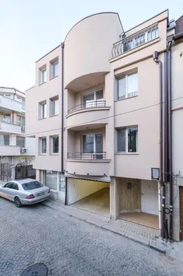 a building with a car parked in front of it at The Hill House Free Parking in Plovdiv