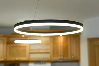 a light fixture hanging from a ceiling in a room at Cozy 2BDR & Peaceful Location & Free Street Parking in Blagoevgrad