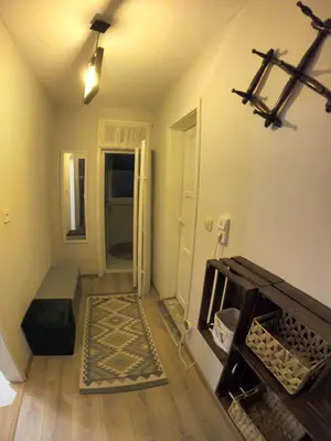 an empty living room with a room with a ceiling at Mini Quiet Central Studio in Pazardzhik