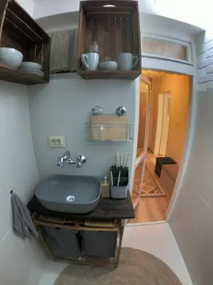 a bathroom with a sink in a room at Mini Quiet Central Studio in Pazardzhik