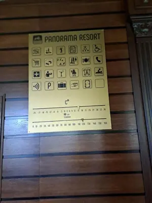 a sign for a pantomime room on a wooden floor at Apartment Wintermärchen Bansko in Bansko
