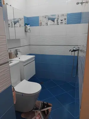 a bathroom with a toilet and a sink at Art Apart - Top Center in Sofia