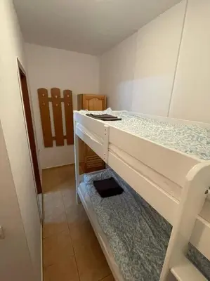 an empty bunk bed in a room at FLORA Apartment Hotel 412 in Borovets