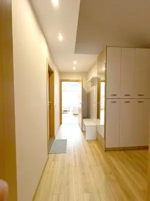 a bathroom with white cabinets and a toilet in a room at Old City Views - Luxury 2BDR Apt & Free Parking in Sofia