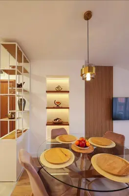 a dining room with a glass table and chairs at Designer apartment at Pirin Sense in Bansko