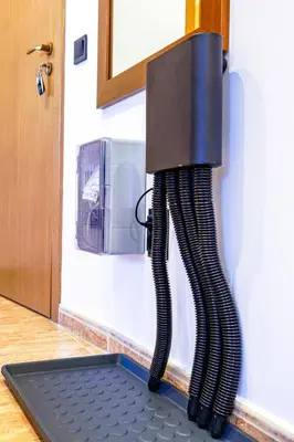 a heater is attached to a wall at Yeti Apartment Pamporovo Grand Monastery in Pamporovo