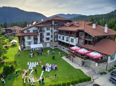 a group of people standing in front of a building at Golden Lake 526 at Oak Residence in Smolyan