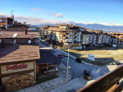 an aerial view of a city with buildings and a street at Great view studio Pirin Palace in Bansko