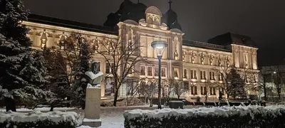 a large building with a statue in front of it at Spacious, Comfortable Top Central Apartment in Sofia