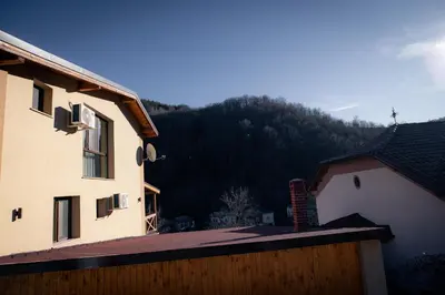 a view from the roof of a house with a mountain at Къща за гости 'Кадийца' in Sushitsa