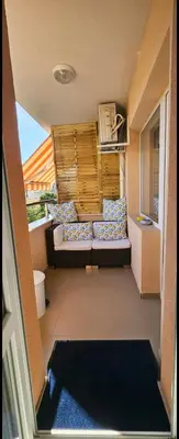 a small balcony with a couch in a room at Boutique Apartment blue 3 in Plovdiv
