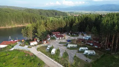 an aerial view of a campgrounds next to a lake at Къмпинг Alino Lake in Alino