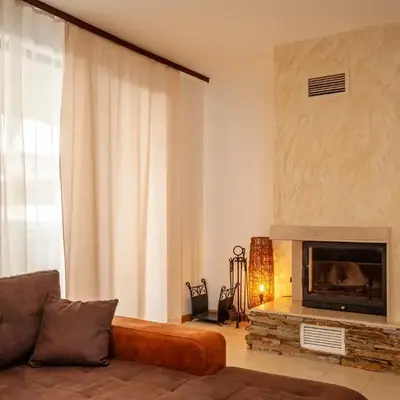 Holiday home with indoor fireplace