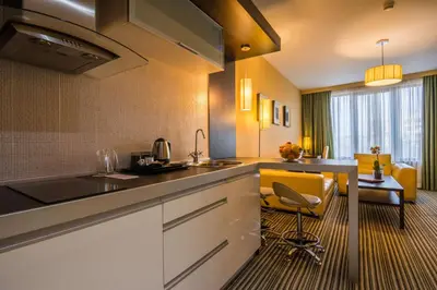 a kitchen with a sink and a counter top at Best Western Plus Olives City Hotel - Free Pool & Parking in Sofia