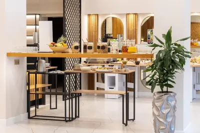 a kitchen with a counter with food on it at Divine mountain studio - parking - SPA in Bansko