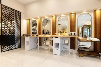 a dressing room with a counter with mirrors at Divine mountain studio - parking - SPA in Bansko