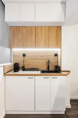 a kitchen with white cabinets and a sink at AGIA 3-comfort apartment Sofia in Sofia