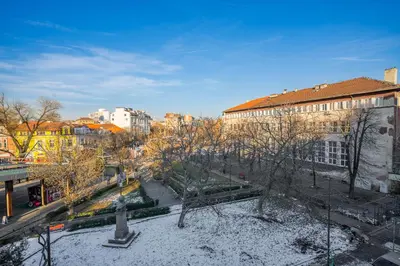 a view of a city with trees and buildings at Charming 1BD Apartment Next to Women's Market by Flat Mаnager in Sofia
