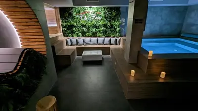 a hot tub in the middle of a room at Апартамент с люлка и гледка в The House с Термална зона in Velingrad