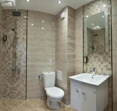 a bathroom with a toilet and a sink and a shower at Mon Ami Apart in Studentski Grad Area in Sofia