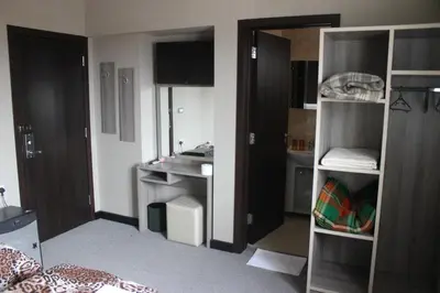 a small room with a sink and a bathroom at Guest House Veni in Blagoevgrad