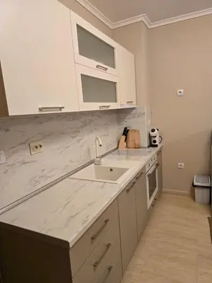 a kitchen with a sink and a counter top at Костадинов 2 in Pamporovo