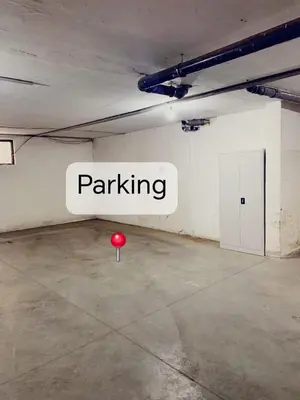 a garage with a red ball in a room at Elegant Two Bedroom Apartment - Top Location in Bansko