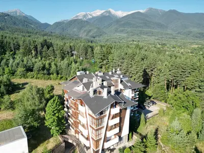 an aerial view of a building with a roof at Bansko soul relax place in Bansko