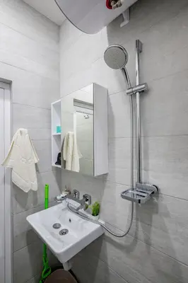 a bathroom with a sink and a shower at Cozy and Central 2BD Flat - At the Heart of It All by Flat Mаnager in Sofia