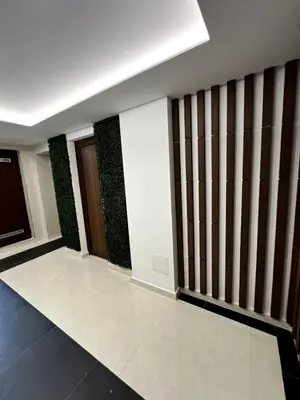 a room with brown and white stripes on the wall at Atayana Apartment in Sofia