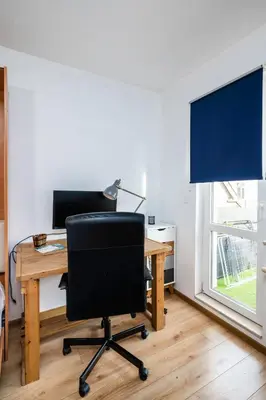 an office with a desk and a chair and a window at Charming & Cozy 2BD Apartment with Natural Light by Flat Mаnager in Sofia