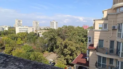 a view of a city with tall buildings and trees at Two-bedroom Apartment Lauta 28 in Plovdiv
