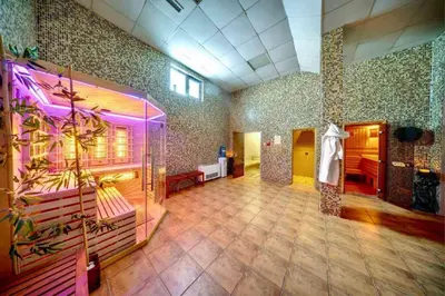 a large room with a pink room with aperature at From Sunrise to Sunset at Oak Residence Smolyan in Smolyan